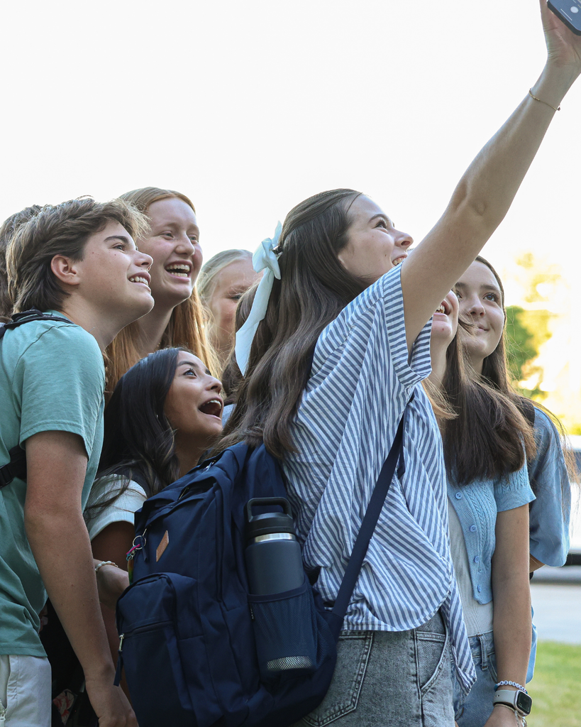 Students taking a selfie.