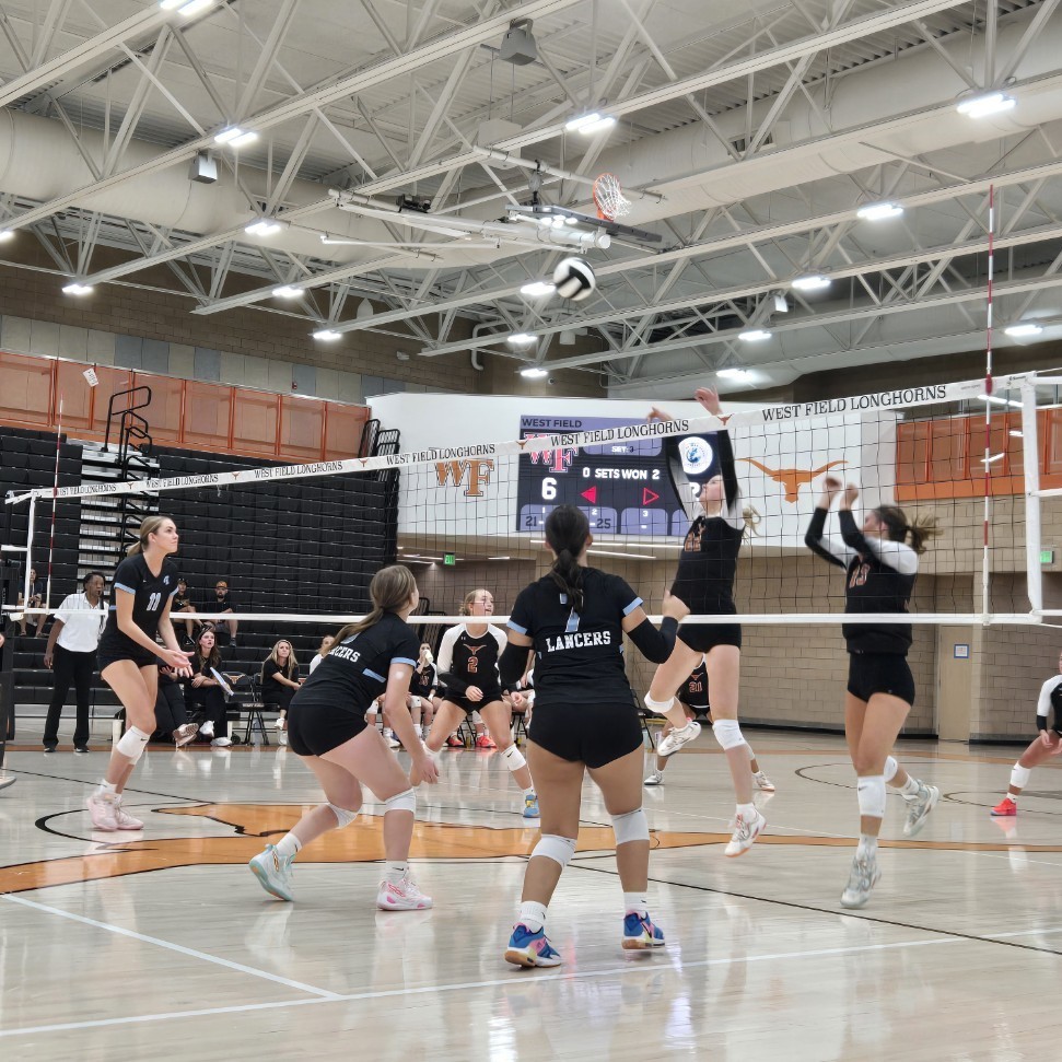 volleyball players watching the ball