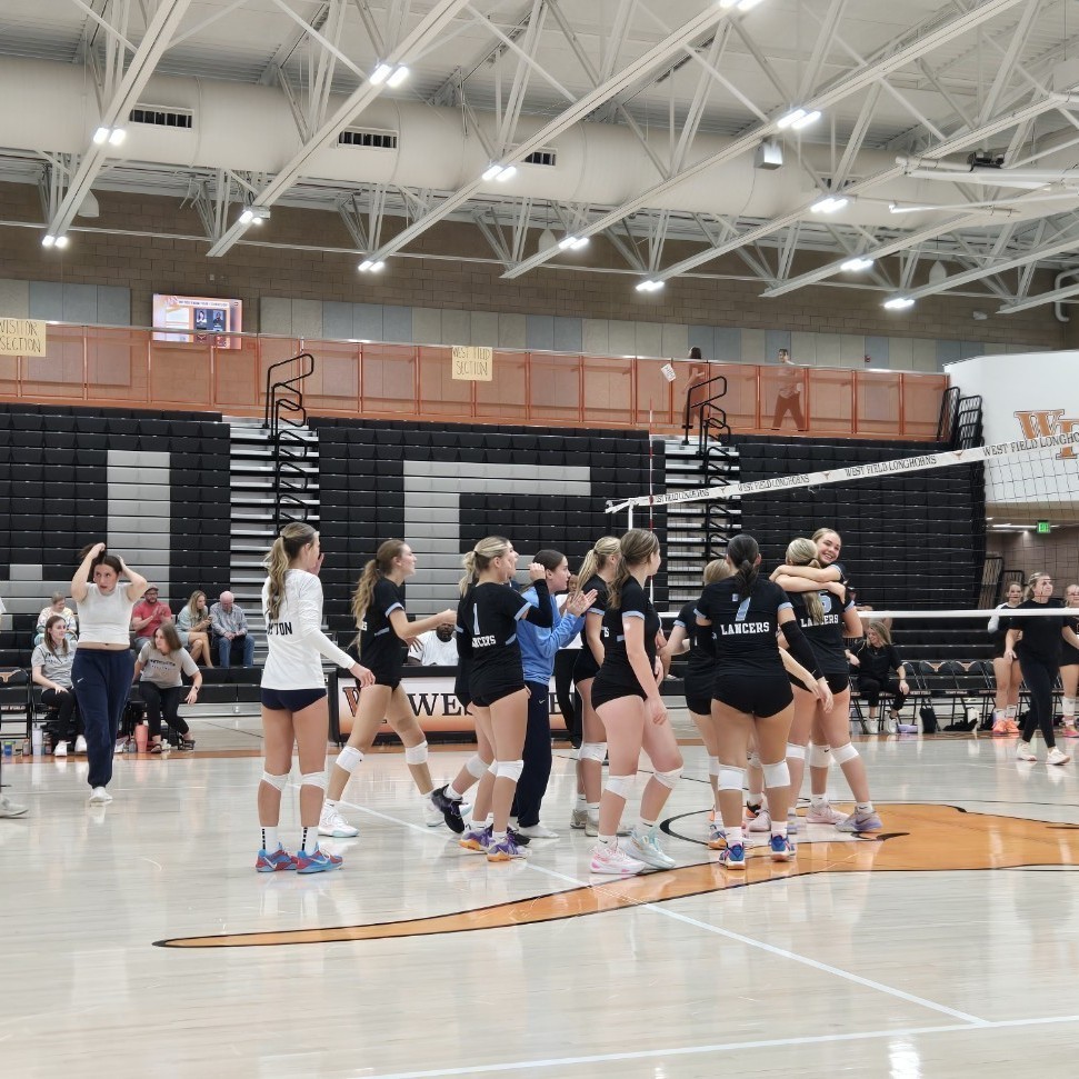 volleyball players celebrating