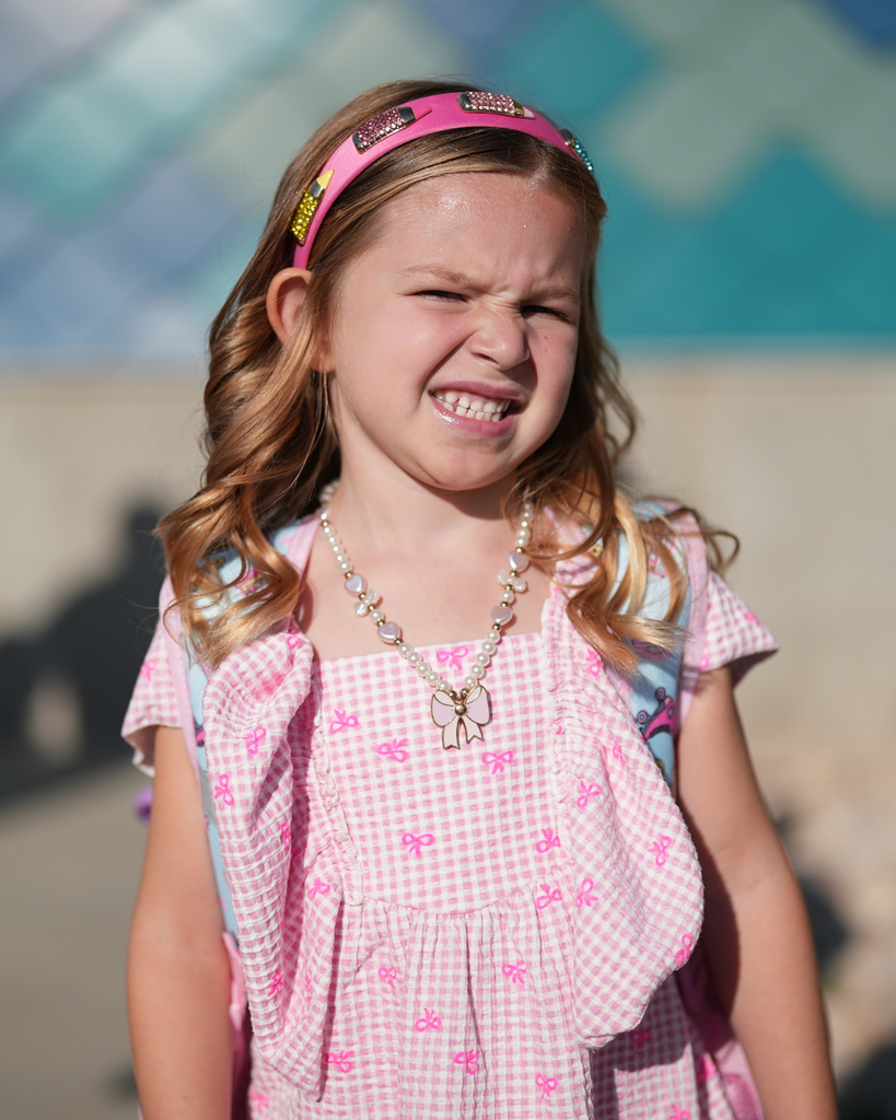 a kindergartener smiling.