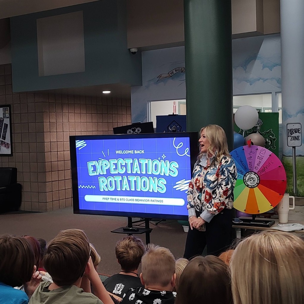 Students listen to a presentation on Expectation Rotations.