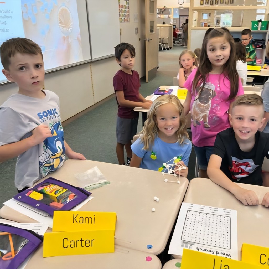 Students work on building together. 