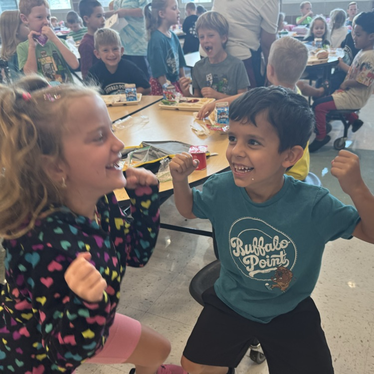 Kids dancing in the cafeteria