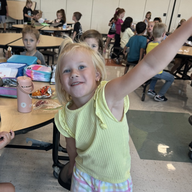 Student dancing in the cafeteria
