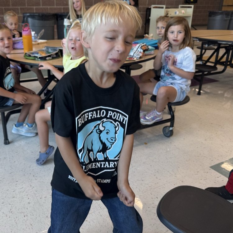 Student dancing in the cafeteria