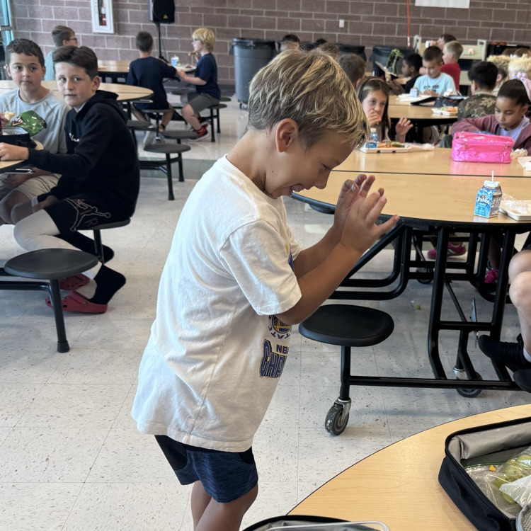 Kids dancing in the cafeteria