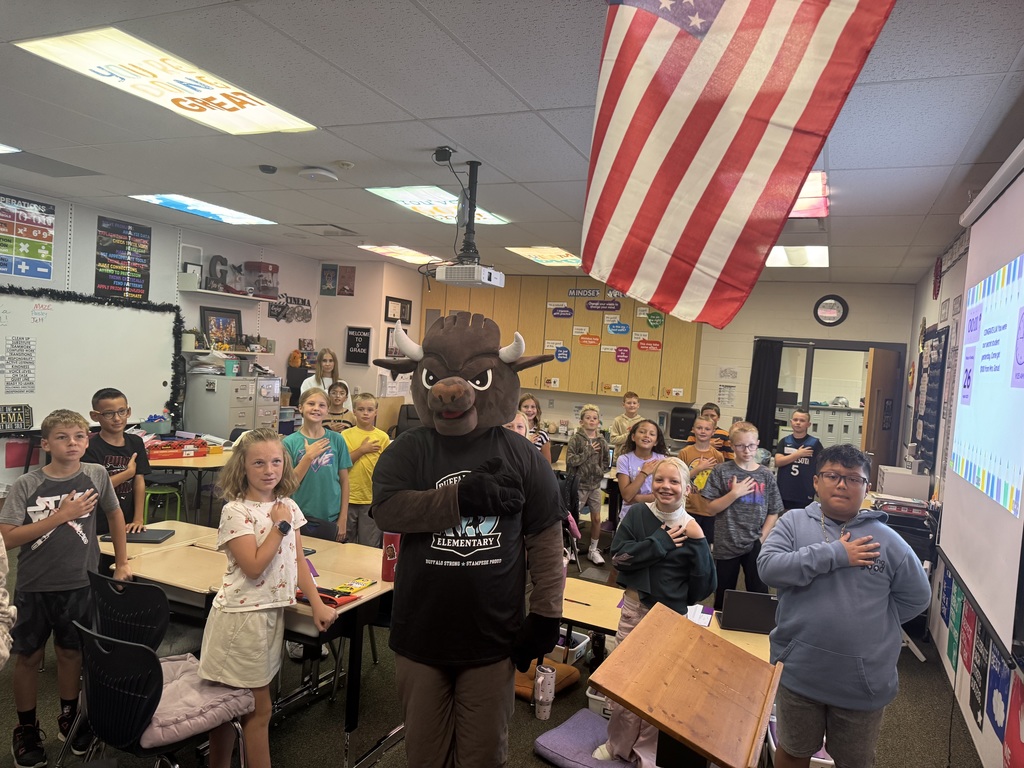 chip saying the pledge with fifth graders