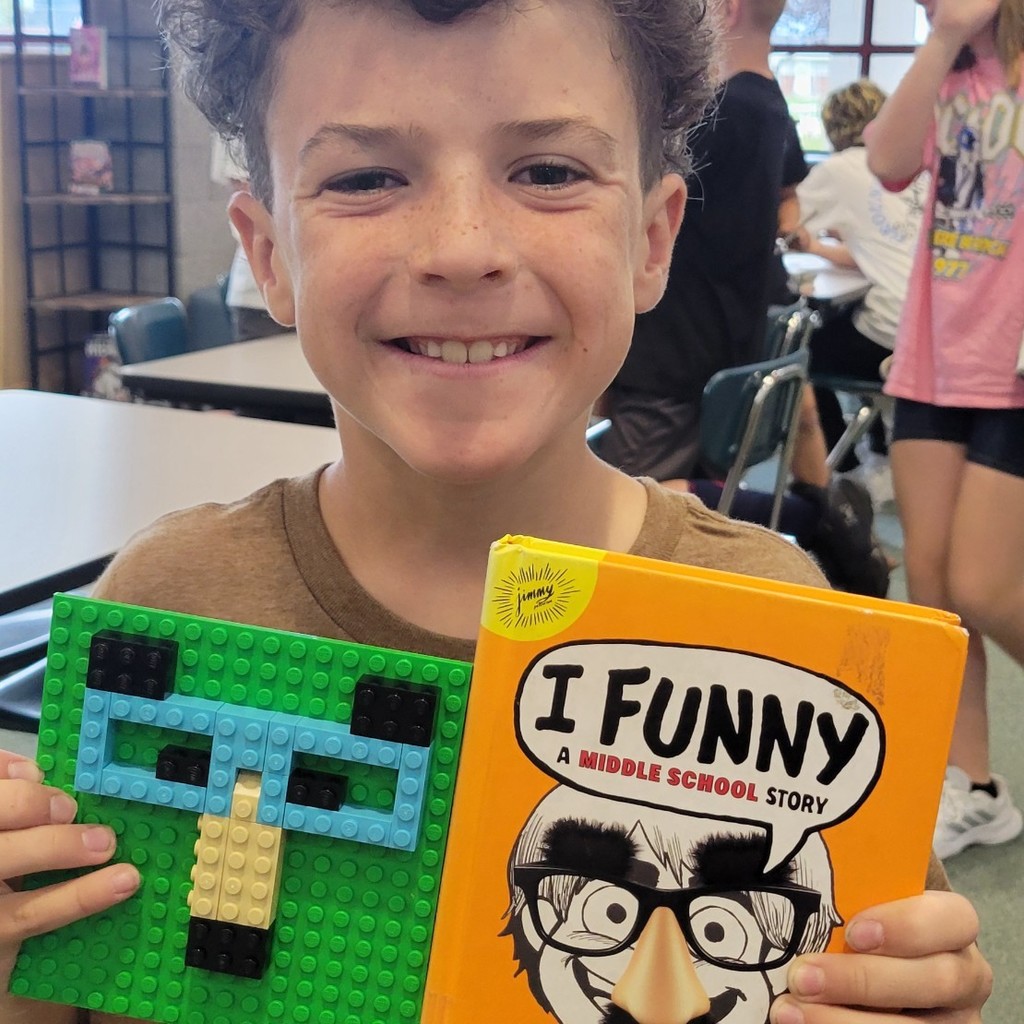 Students build with Legos in Library.
