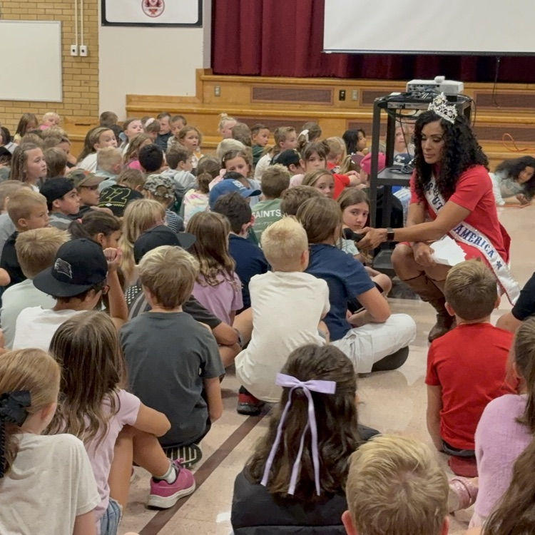 Mrs Utah talking to a student