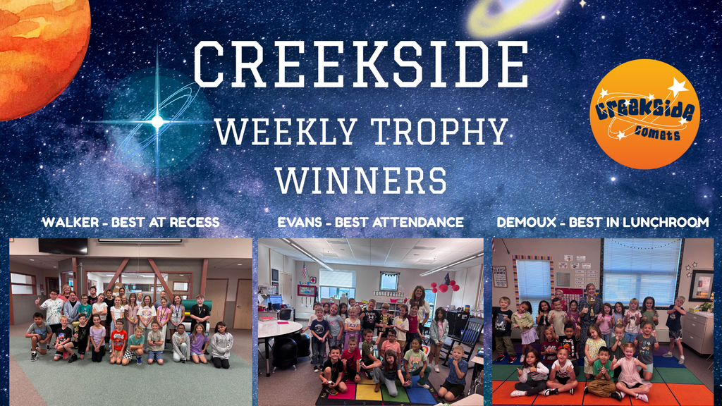 kids in classroom holding a trophy for best at winner