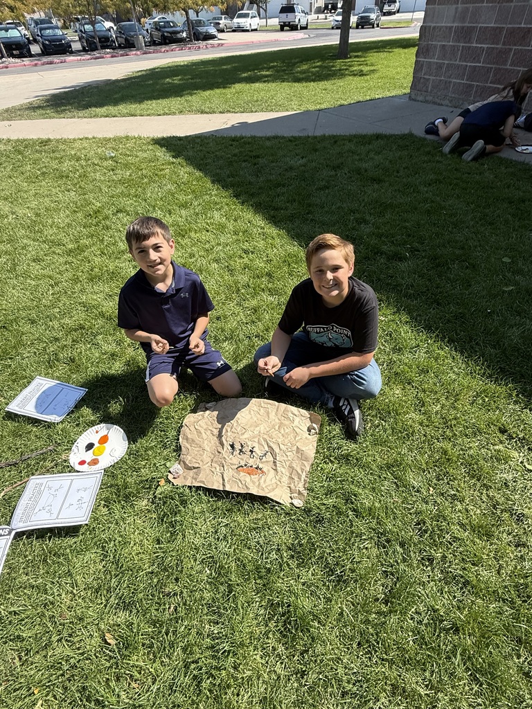 students doing cave painting