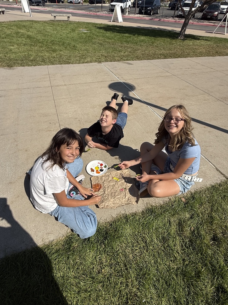 students doing cave painting