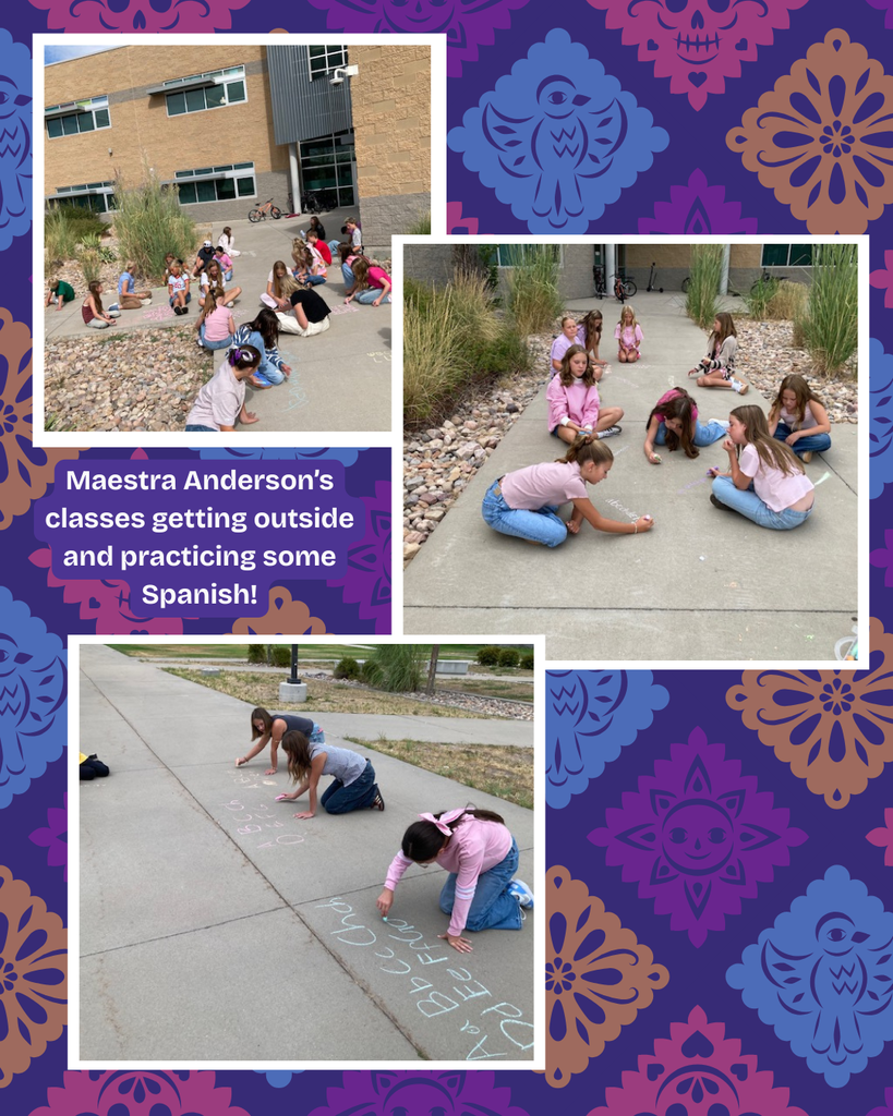 Students outside drawing with chalk