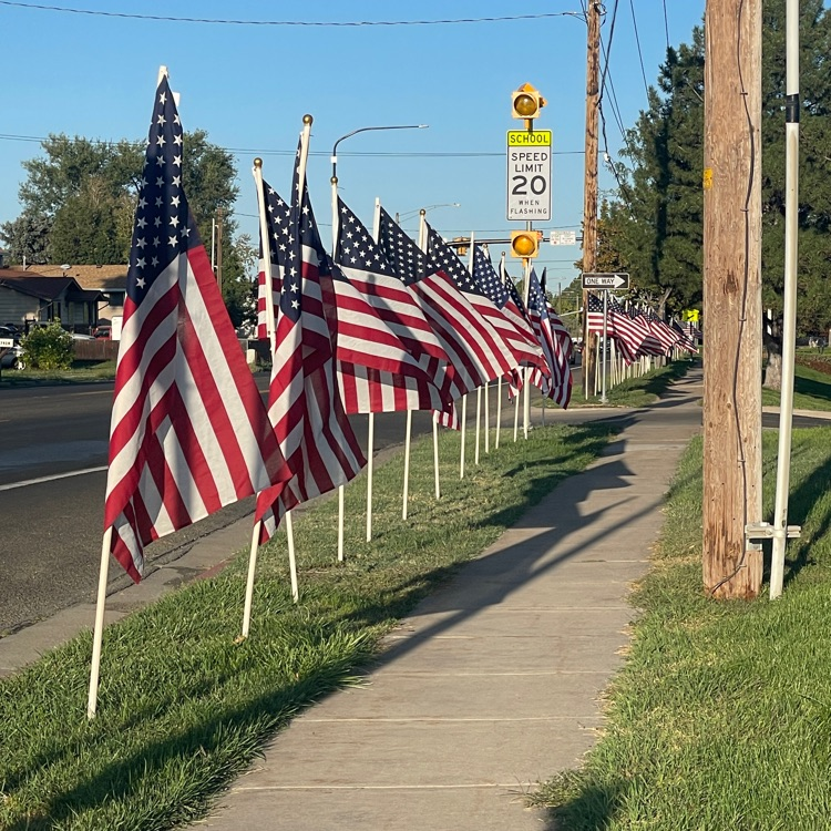 Flags outside West Clinton Elementary