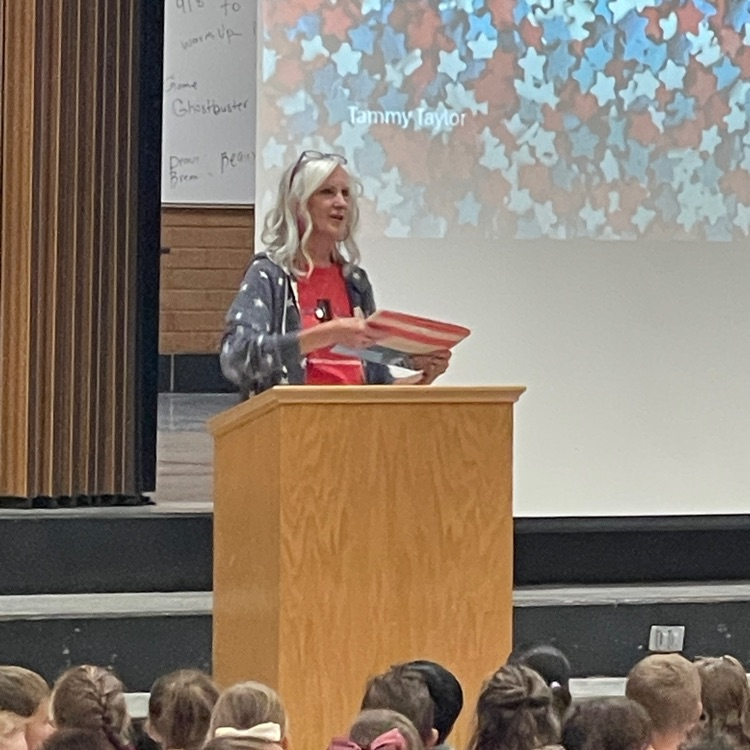 Tamera Taylor teaching West Clinton students about what it means to be a patriot.