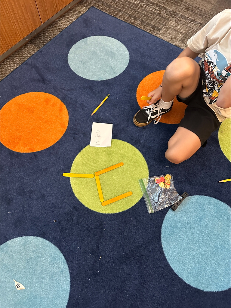 Math manipulatives at a carpet