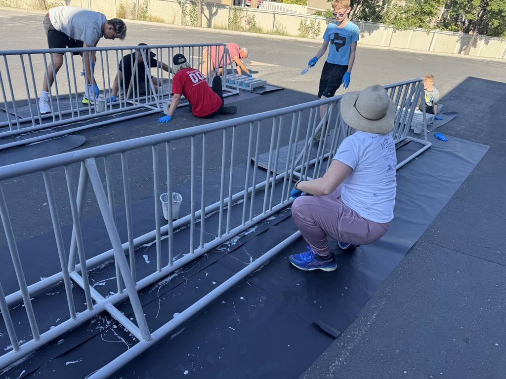volunteers painting bike racks