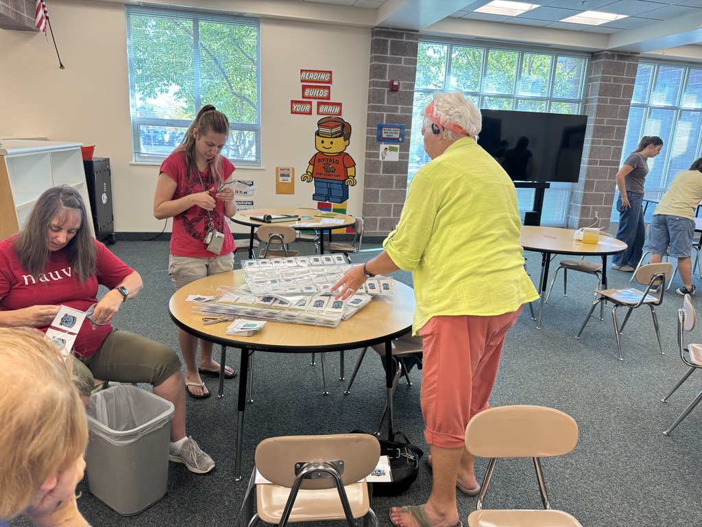 volunteers working in the library