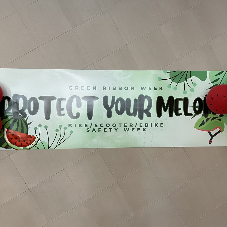 Green poster saying protect your melon