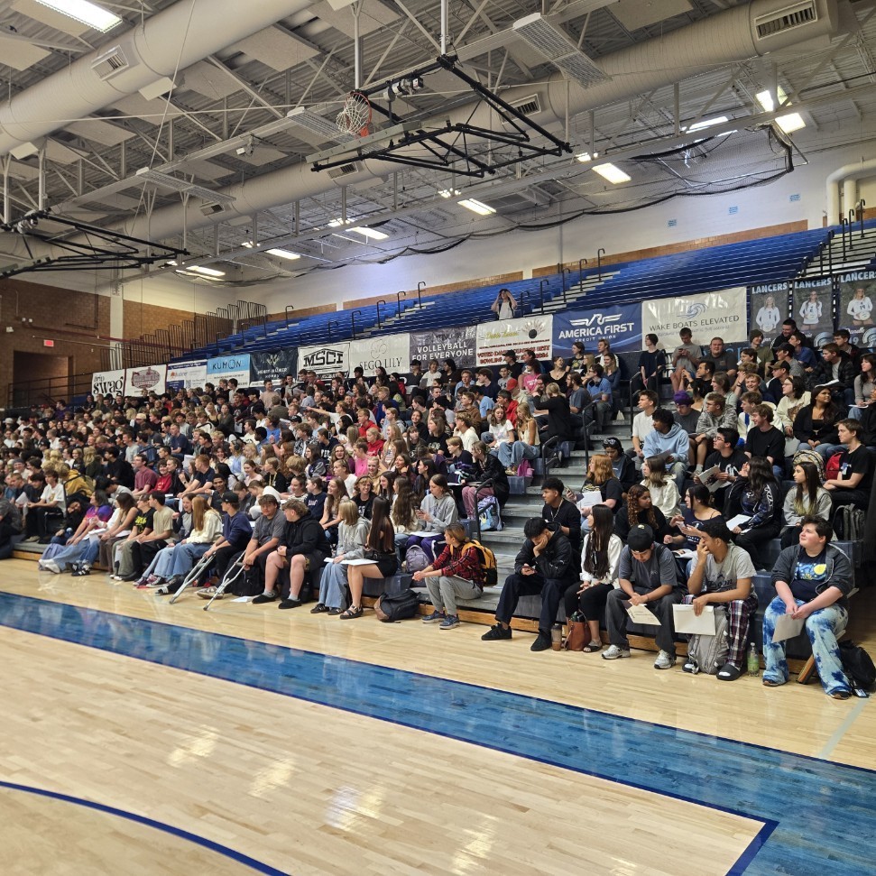 seniors in the stands watching the assembly