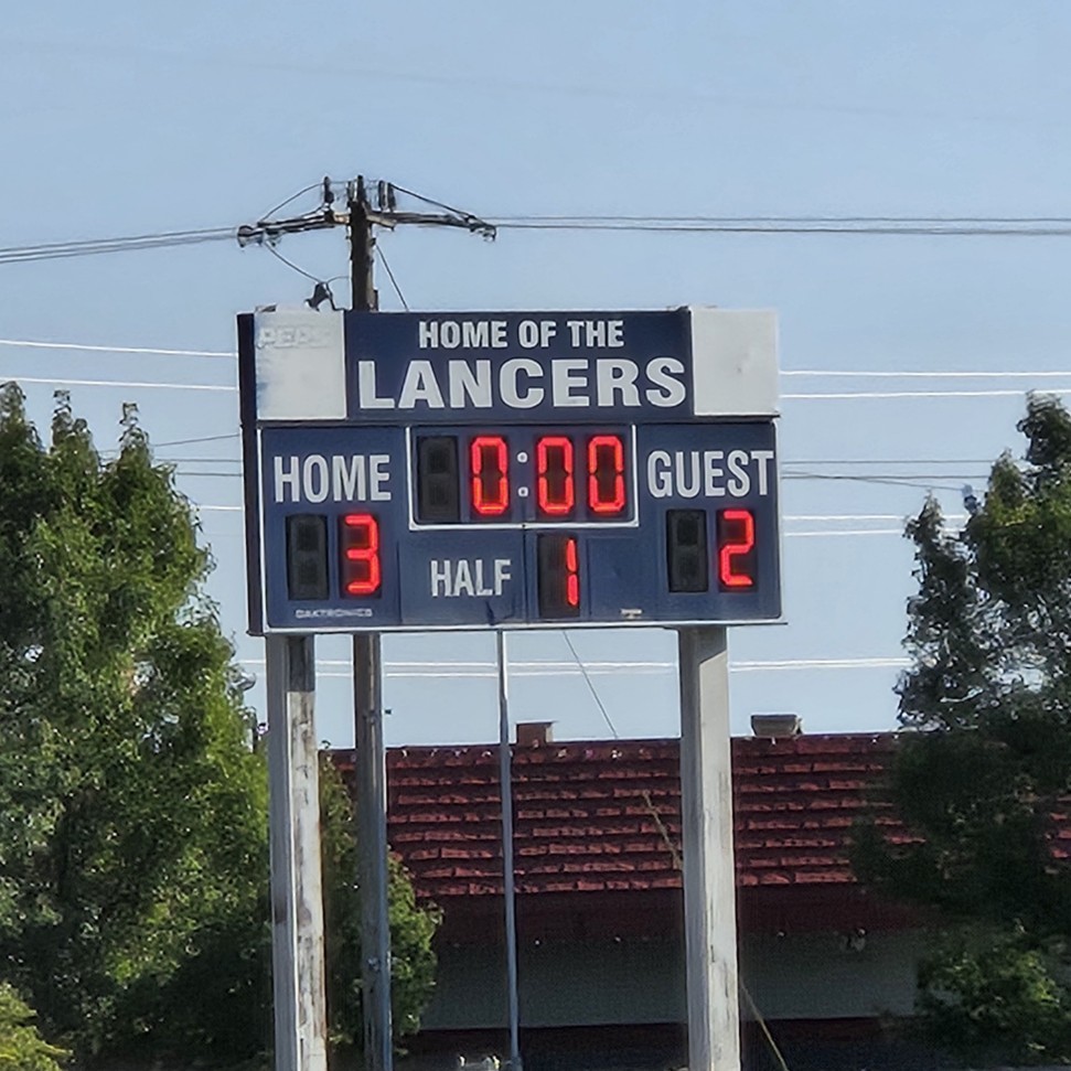 scoreboard showing Layton wins 3-2