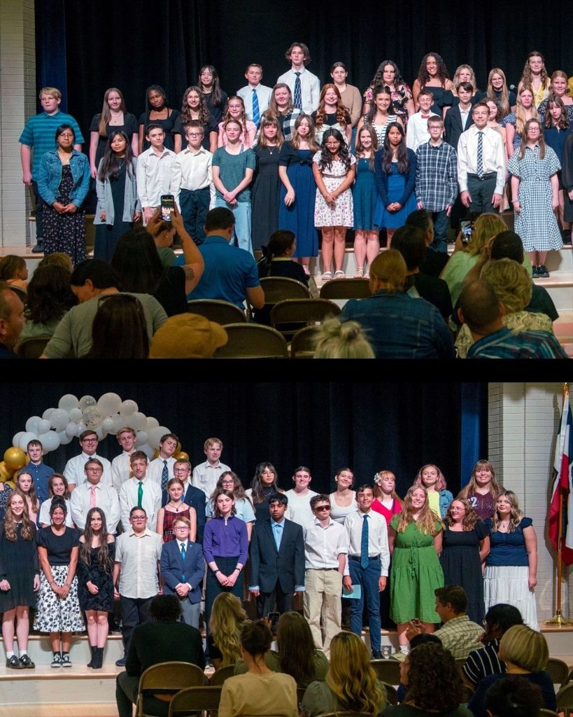 Over 75 students stand on stage 