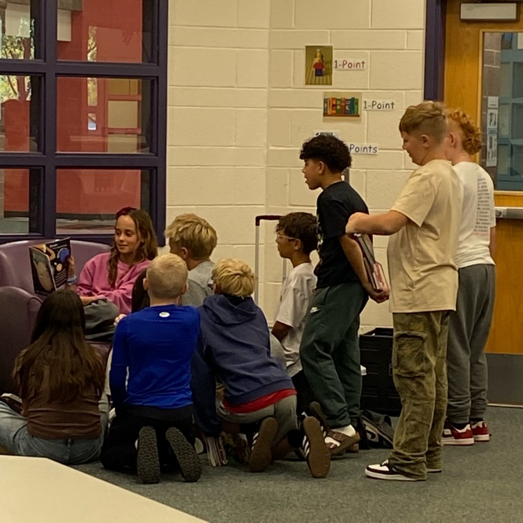 Sixth grade students in library