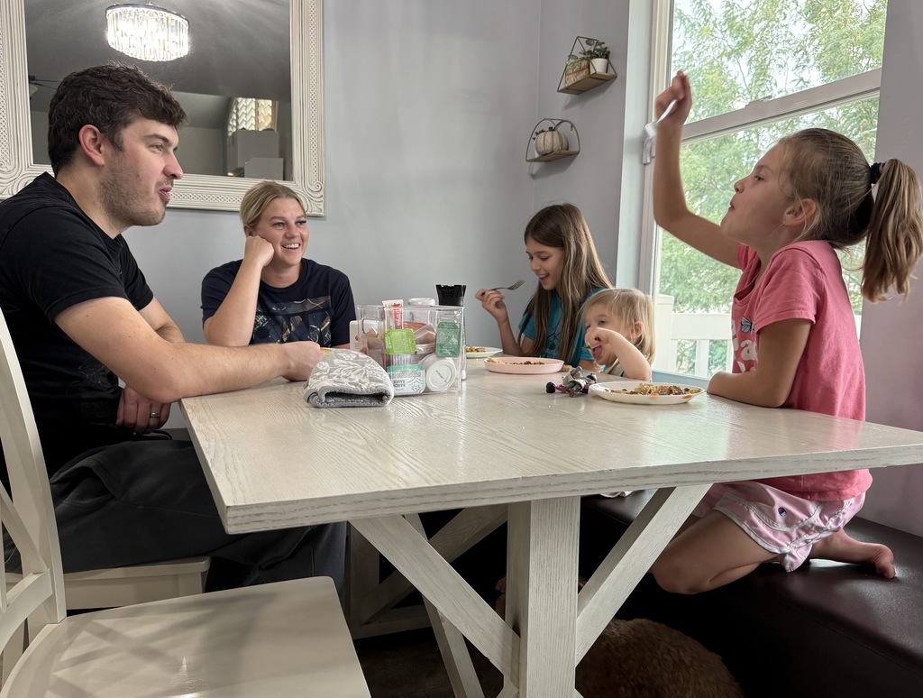 family enjoying dinner together