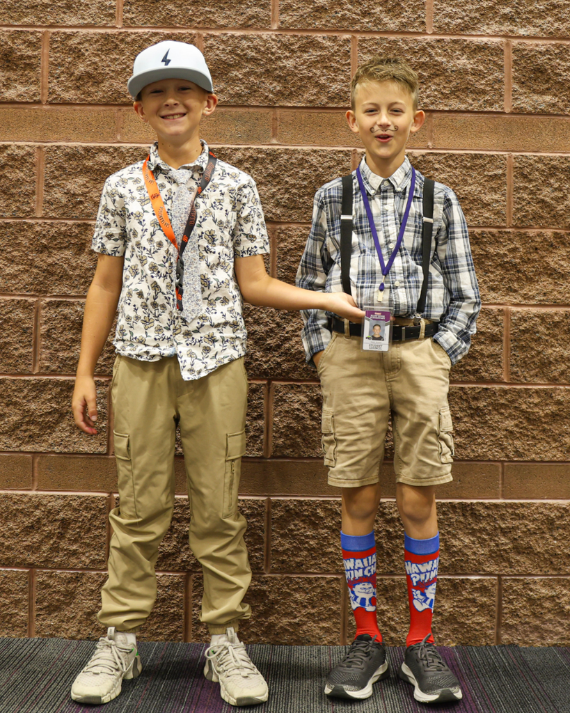 Two students dress their best for dress like a teacher day.