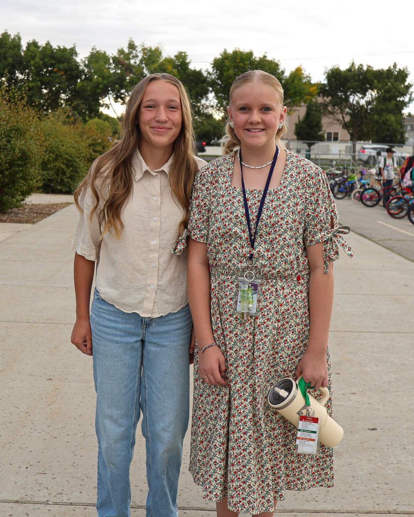 Two students dress their best for dress like a teacher day.