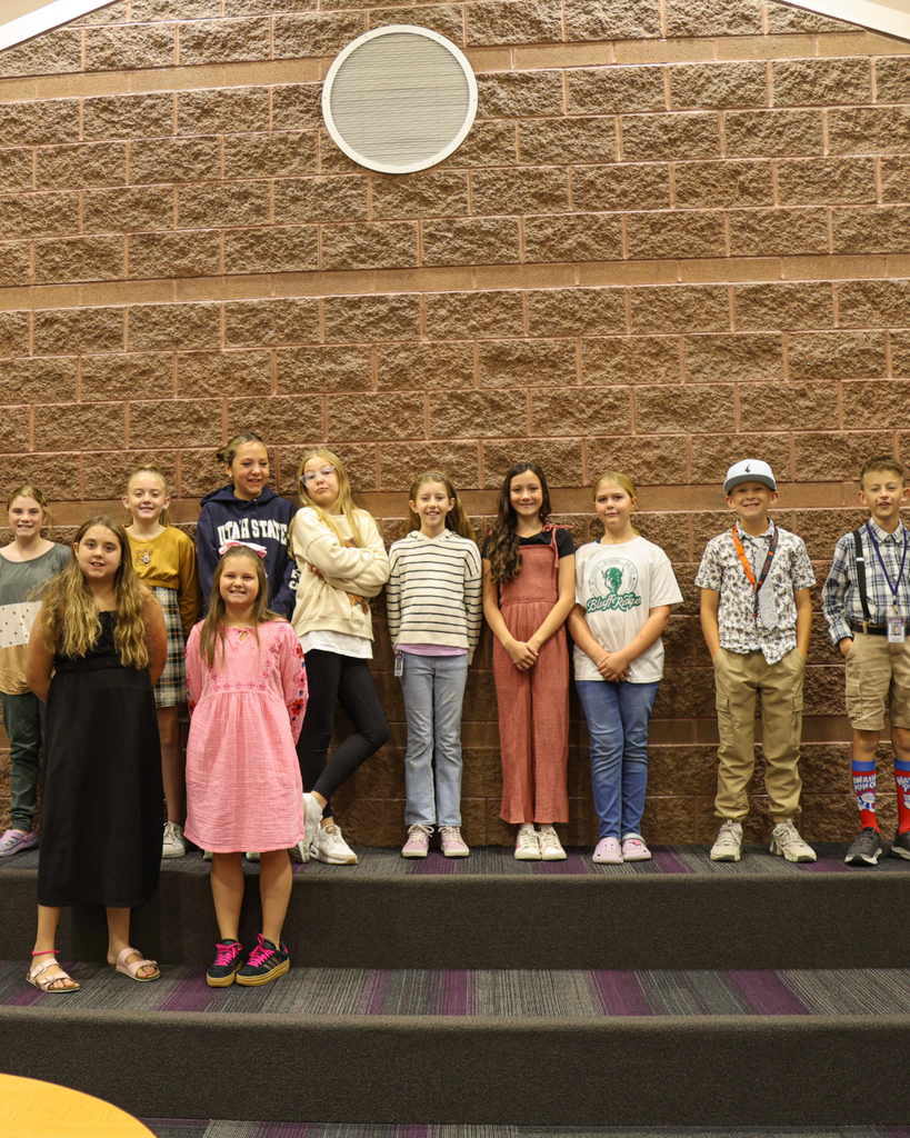 A large group of students smiling at the camera.