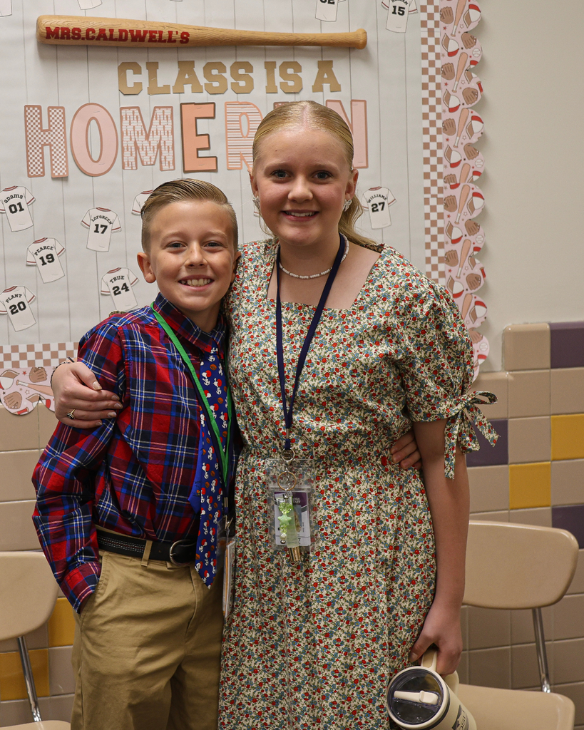 Two students dress their best for dress like a teacher day.