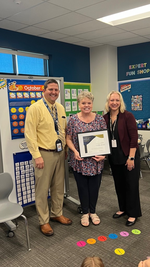Mrs. Adams pictured with Mrs. Page and Mr. Forsgren in the kindergarten classroom.