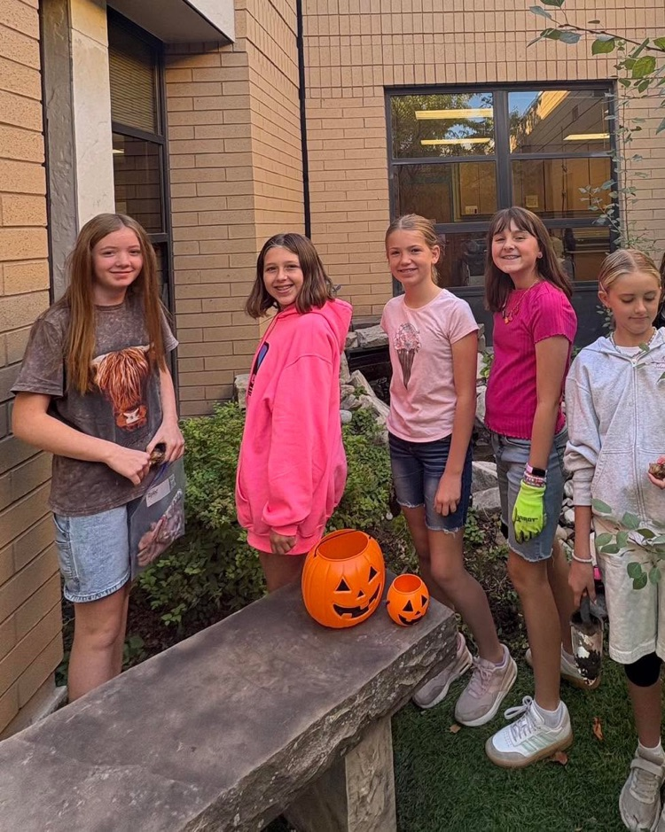 Group of student leaders standing in the courtyard!