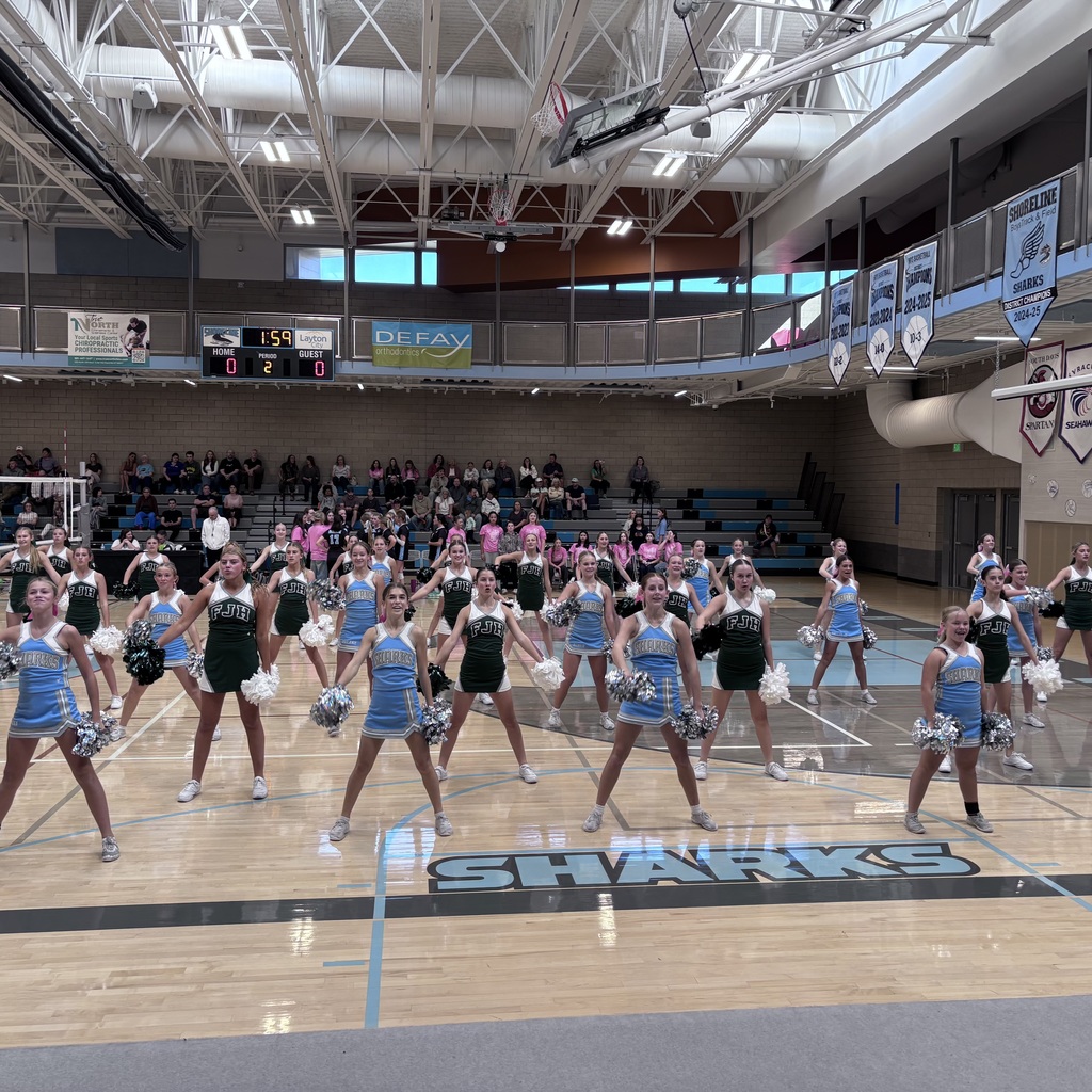 Shoreline and Farmington Cheer teams perform at Quarter Finals Volleyball game