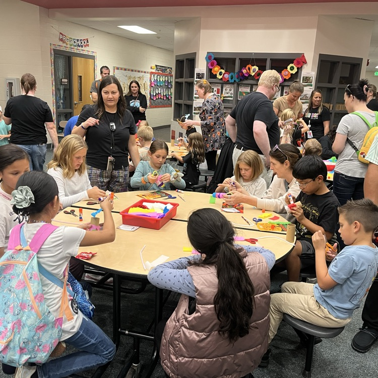 Kids at the festival doing a craft