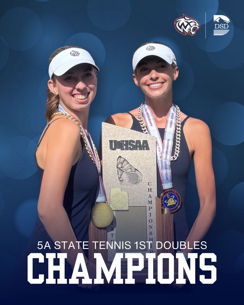 Two tennis players holding up their trophy. The bottom says 5A State Tennis 1st Doubles Champions