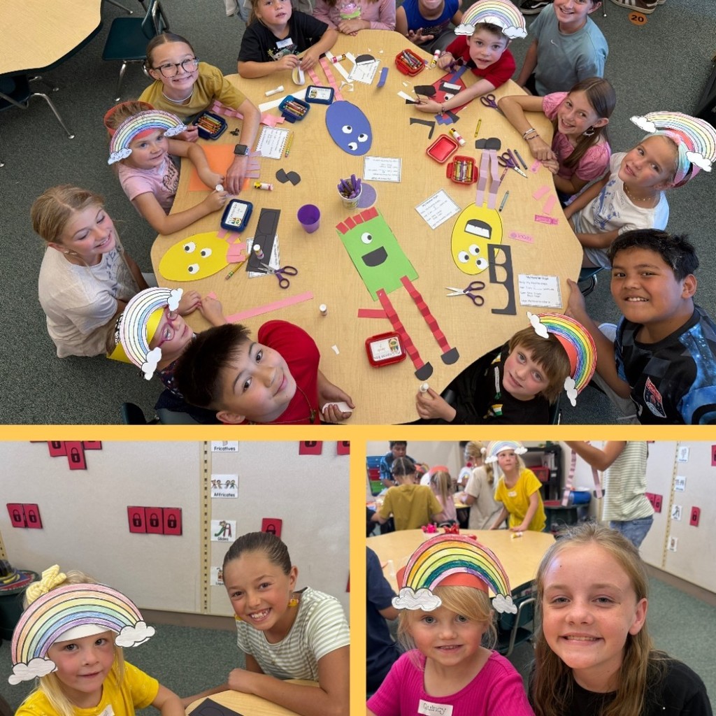 Students work together to build paper monsters.