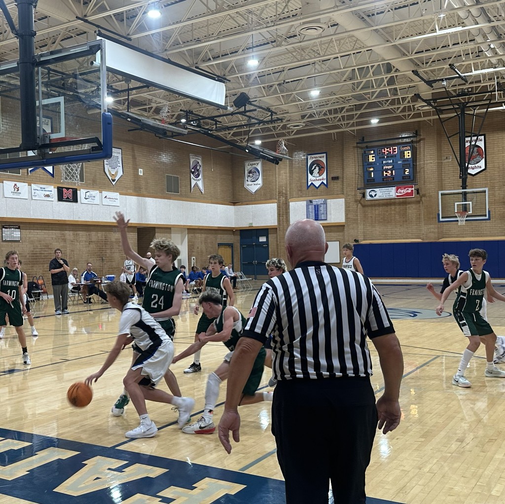 The Fairfield basketball team competing against Farmington Jr.
