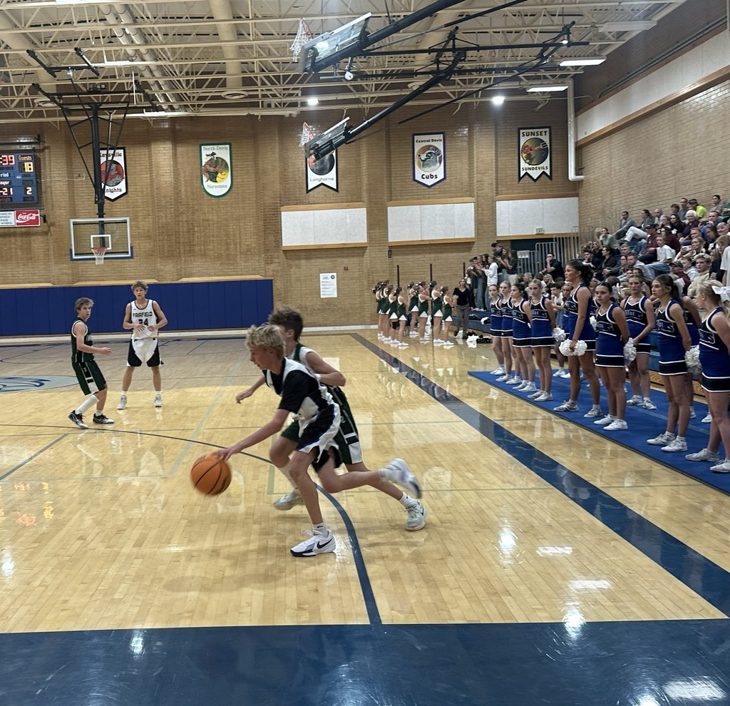 The Fairfield basketball team competing against Farmington Jr.