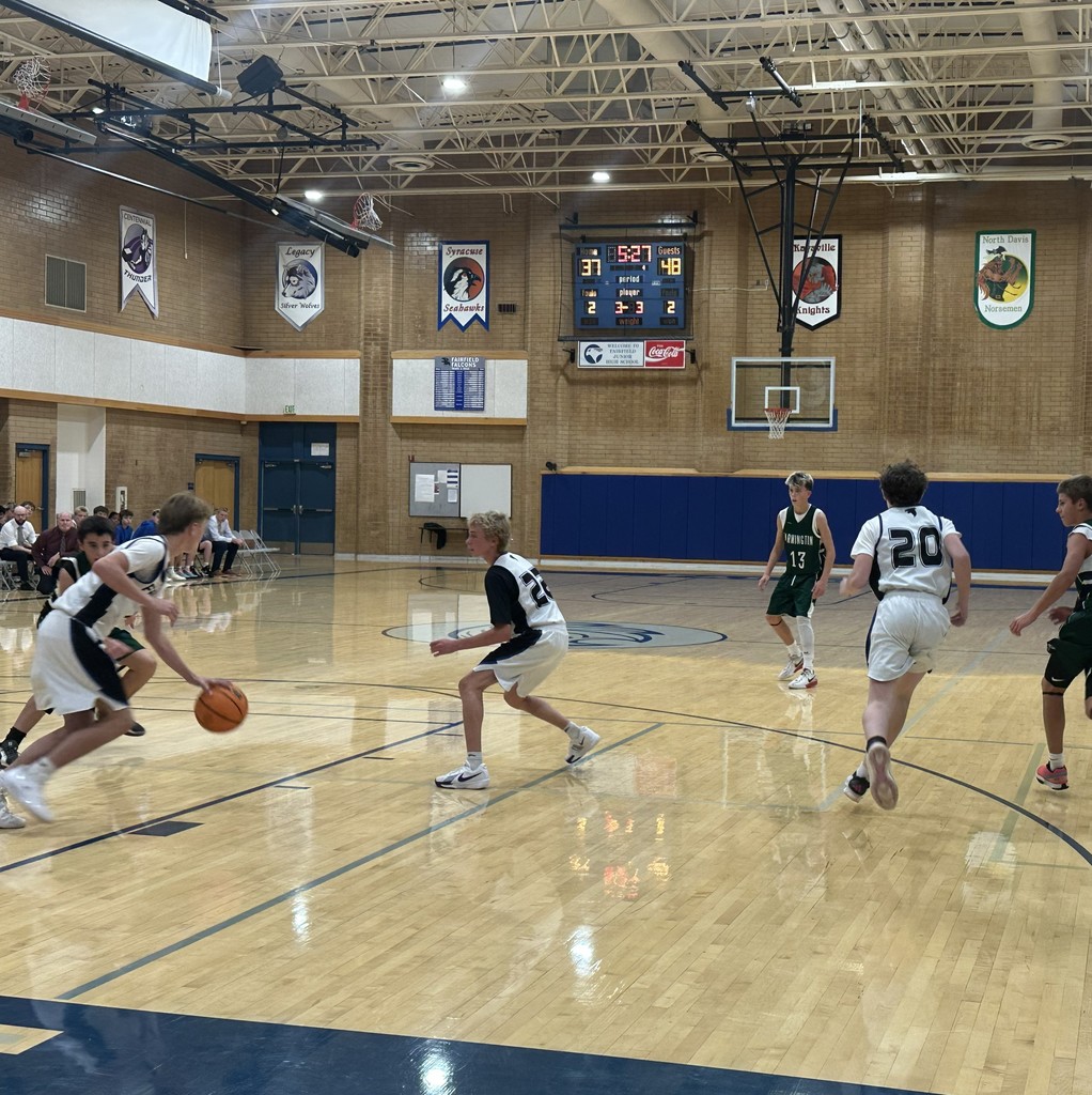 The Fairfield basketball team competing against Farmington Jr.