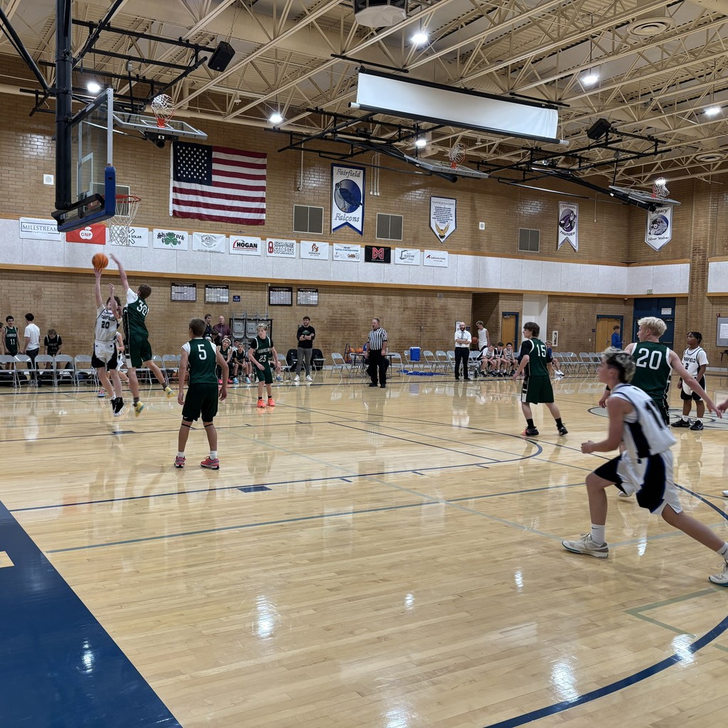 The Fairfield basketball team competing against Farmington Jr.