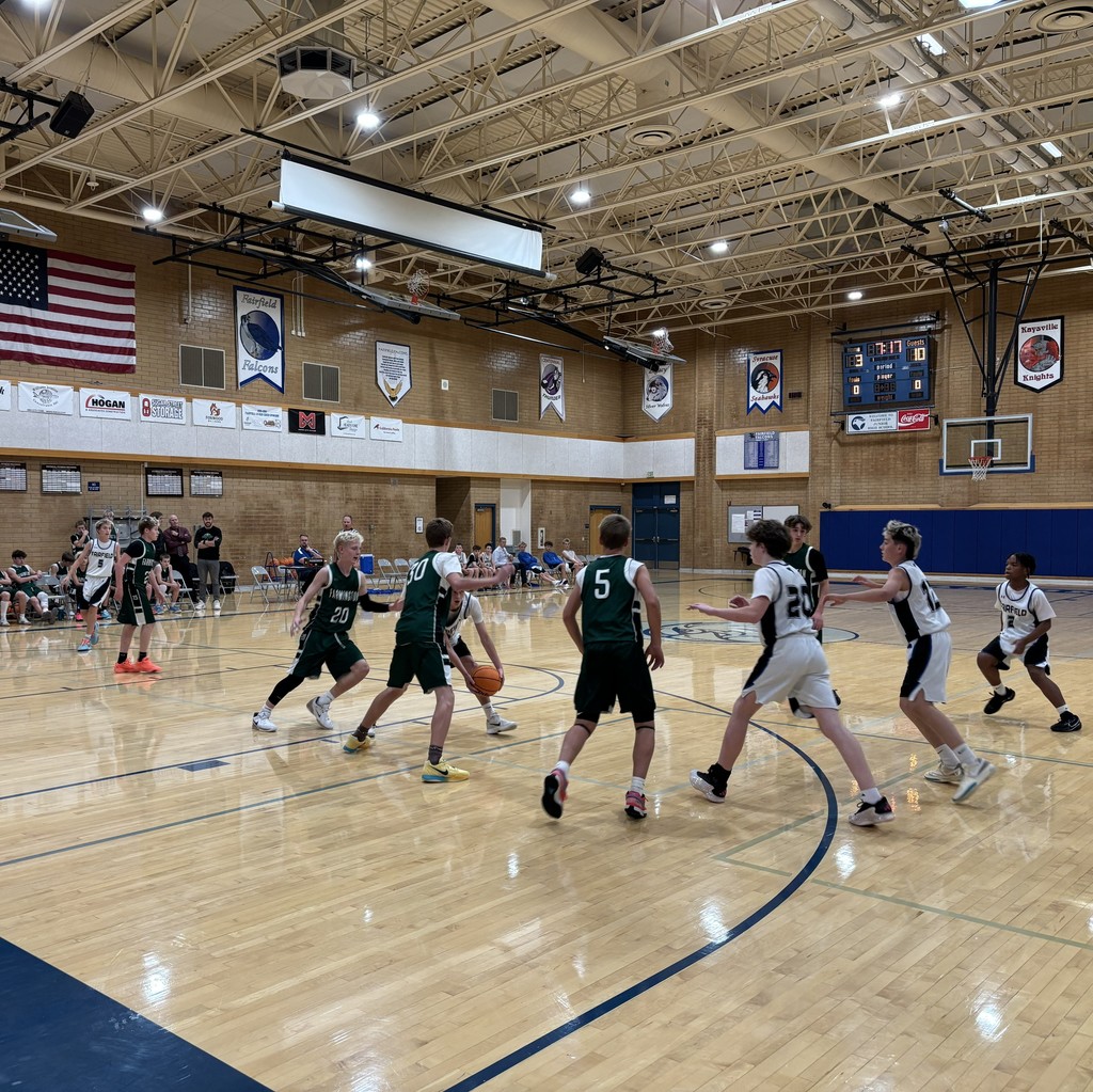 The Fairfield basketball team competing against Farmington Jr.