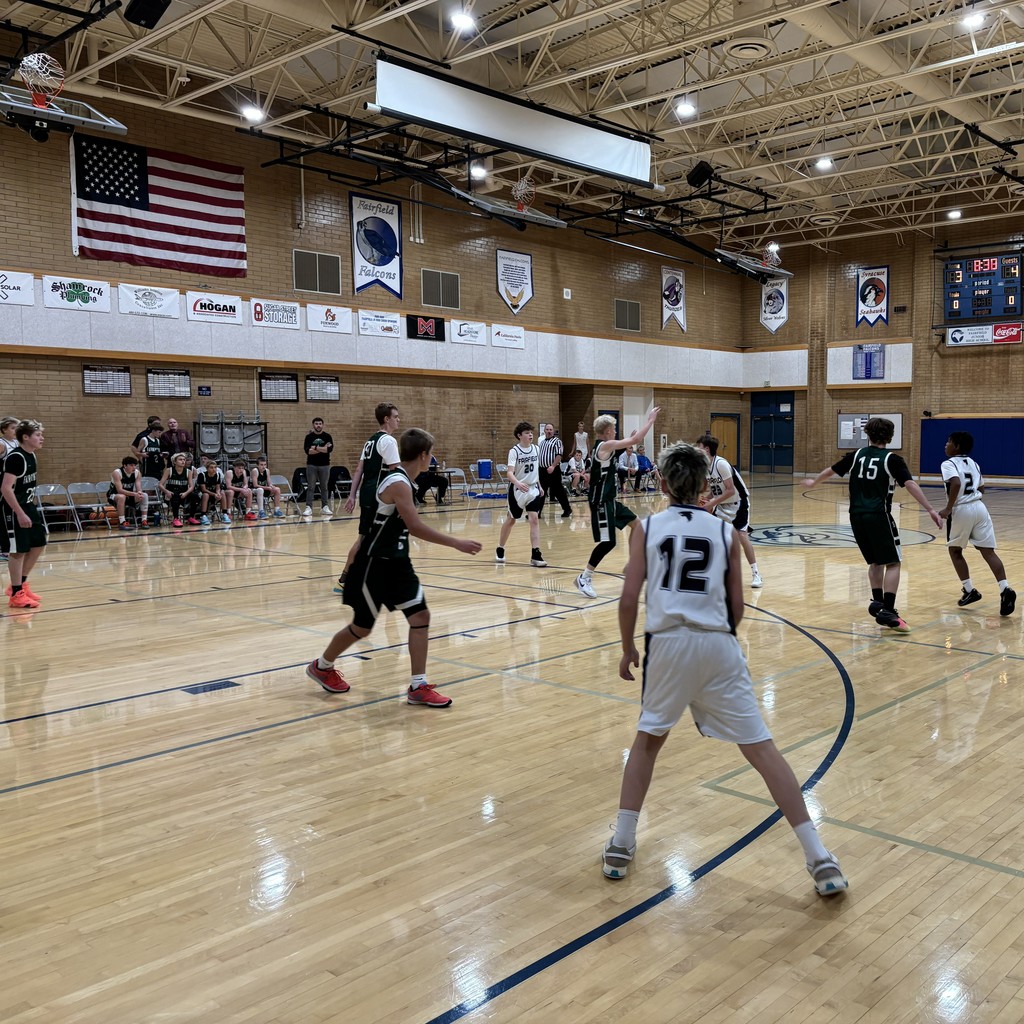 The Fairfield basketball team competing against Farmington Jr.