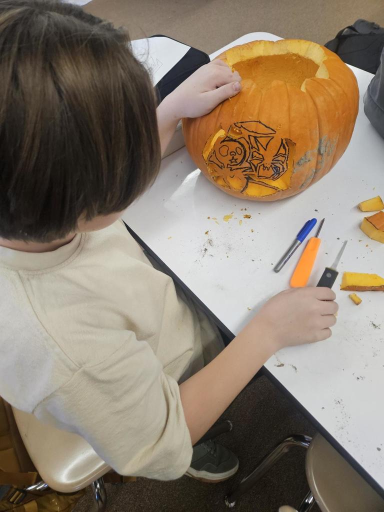Student government pumpkin carving for Syracuse City Pumpkin Walk
