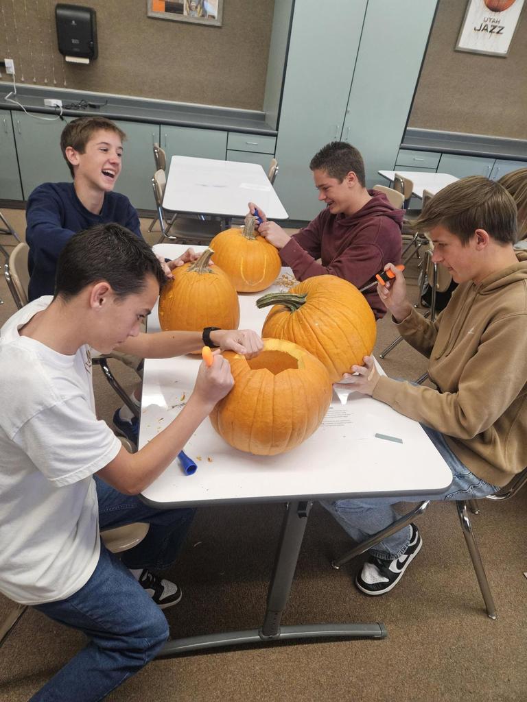 Student government pumpkin carving for Syracuse City Pumpkin Walk