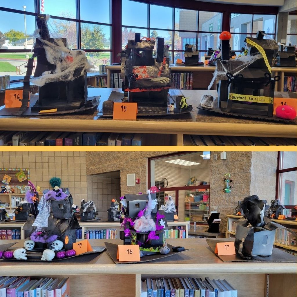 Haunted Houses constructed out of paper and decorated with various Halloween Decorations.