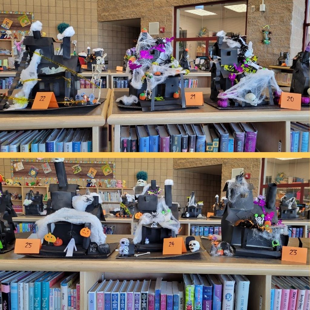 Haunted Houses constructed out of paper and decorated with various Halloween Decorations.