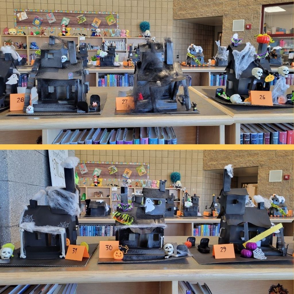 Haunted Houses constructed out of paper and decorated with various Halloween Decorations.