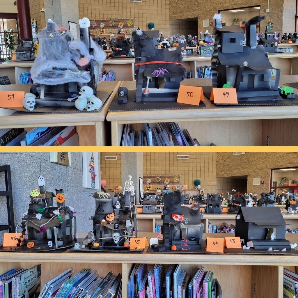 Haunted Houses constructed out of paper and decorated with various Halloween Decorations.